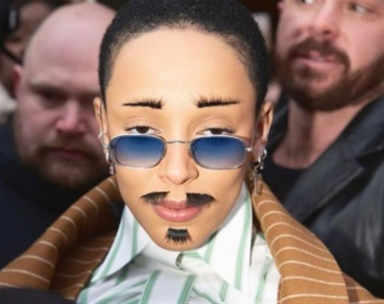 Doja Cat sports moustache days after her crystal inferno look