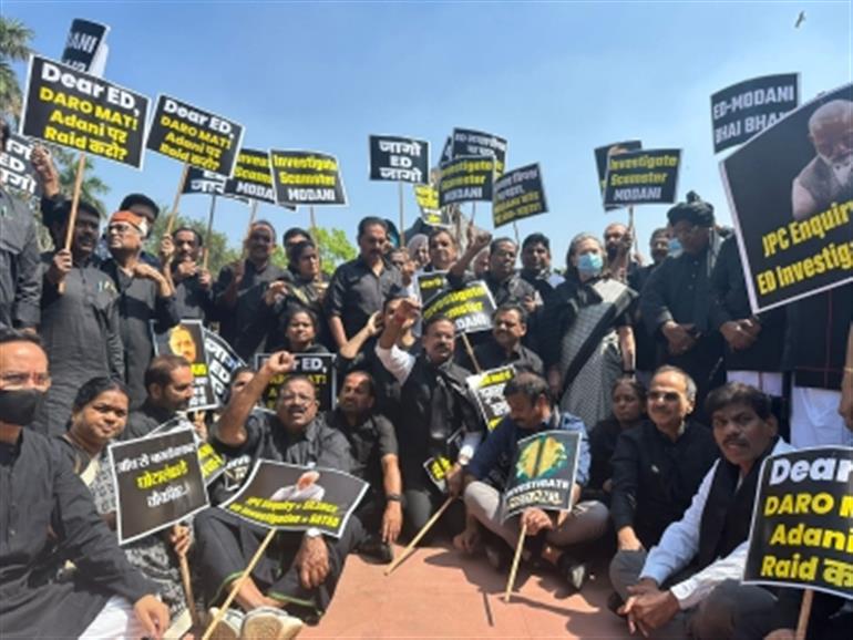 Congress-led oppn members protest outside Parliament, seek probe in Adani matter