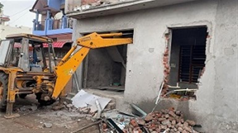 Two more illegal houses of drug smugglers razed in Patiala and Rupnagar