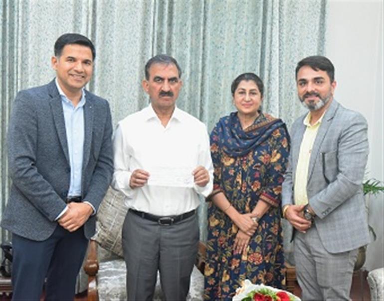 Hindustan Uniliver Limited presented a cheque of Rs 50 lakh to CM relief fund