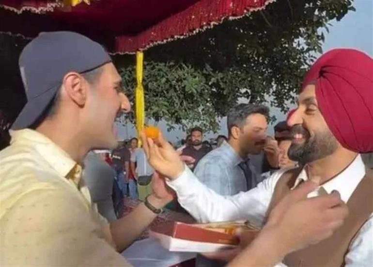 Ahan shared a video on his Instagram Stories in which Diljit Dosanjh is seen lovingly feeding him cake, with a big smile on his face. 